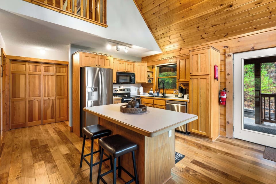 Kitchen island with bar seating, perfect for morning coffee.