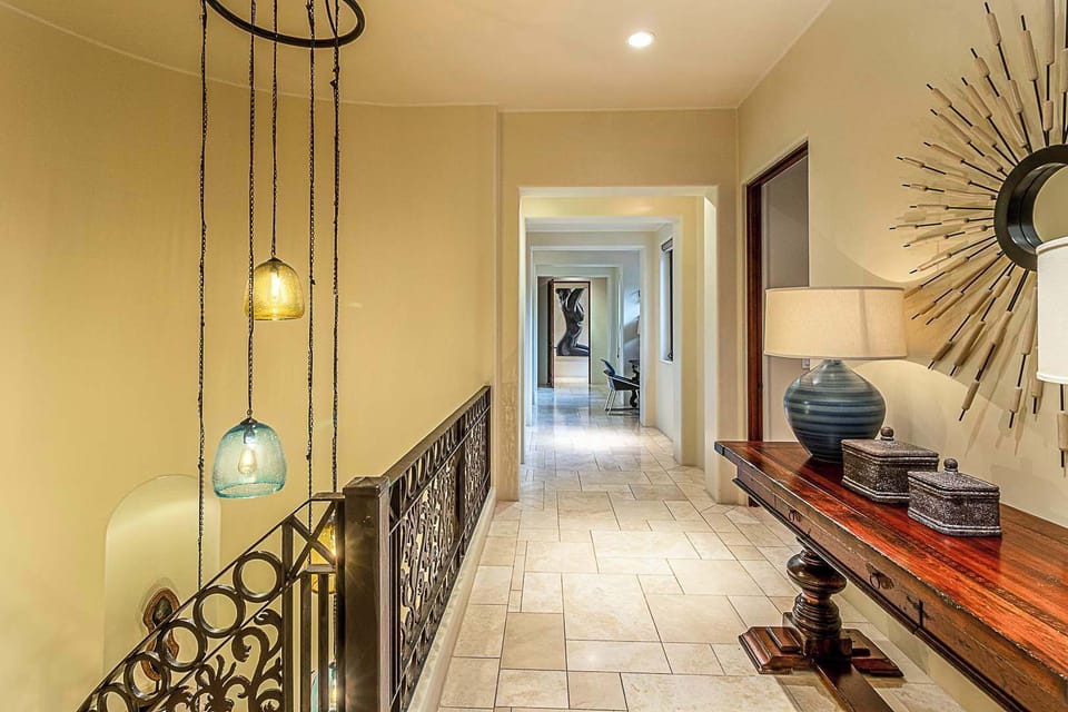 Bright upstairs hallway with decorative accents