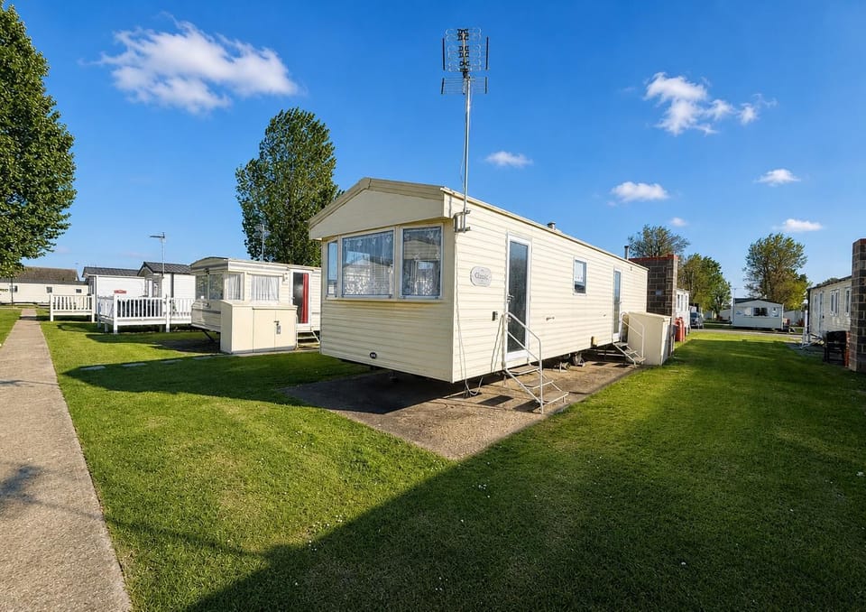 This modern caravan located on Highfield Grange Holiday Park is the perfect place to base yourself before exploring Clacton on Sea for traditional seaside fun.