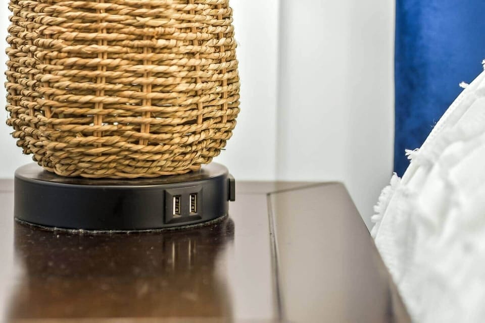 This lamp is also a charging station with a place to plug in.