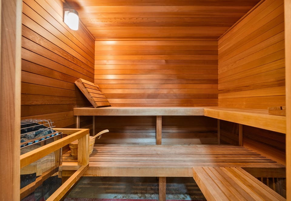 Private cedar sauna for the ultimate relaxation.