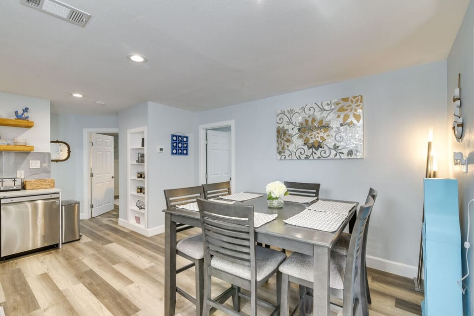 Dining Area | Bright Coastal Space with Seating for Six & Decorative Wall Art