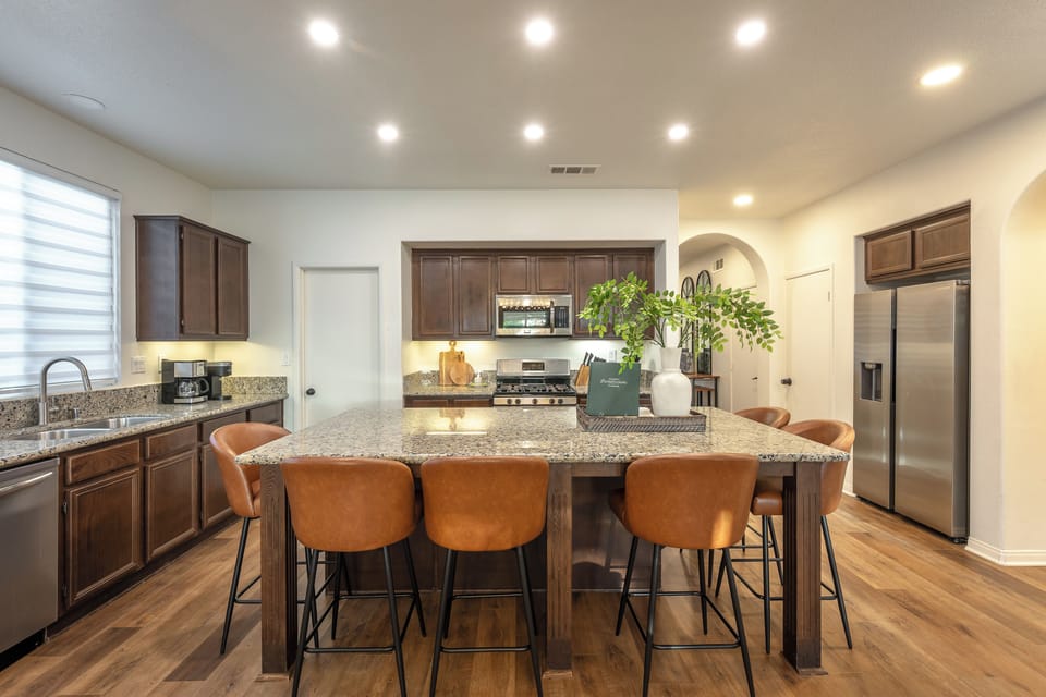 Fully stocked kitchen with large island and bar seating--ideal for group cooking