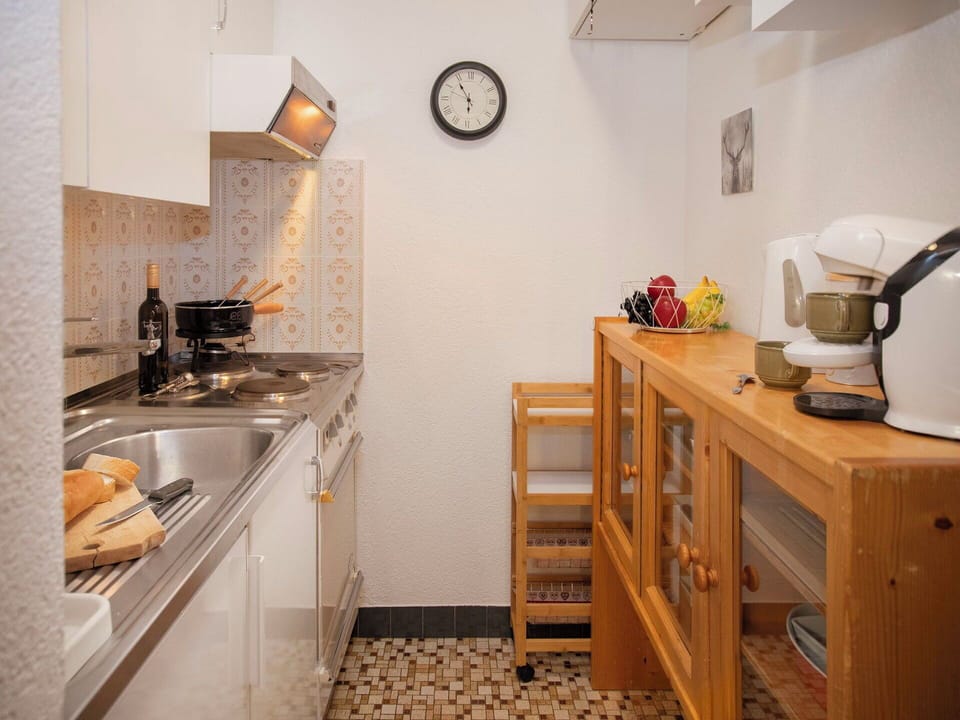 Kitchen Appliance, Kitchen, Countertop, Major Appliance, Cabinetry, Interior Design, Wood, Furniture, Flooring, Home Appliance