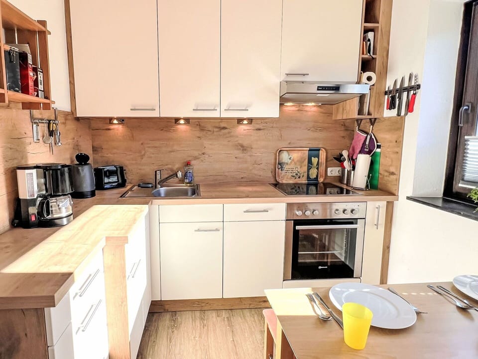 Kitchen Appliance, Kitchen, Countertop, Furniture, Major Appliance, Cabinetry, Flooring, Interior Design, Wood, Home Appliance