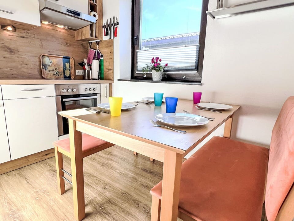Furniture, Interior Design, Flooring, Wood, Major Appliance, Kitchen Appliance, Kitchen, Floor, Room, Countertop