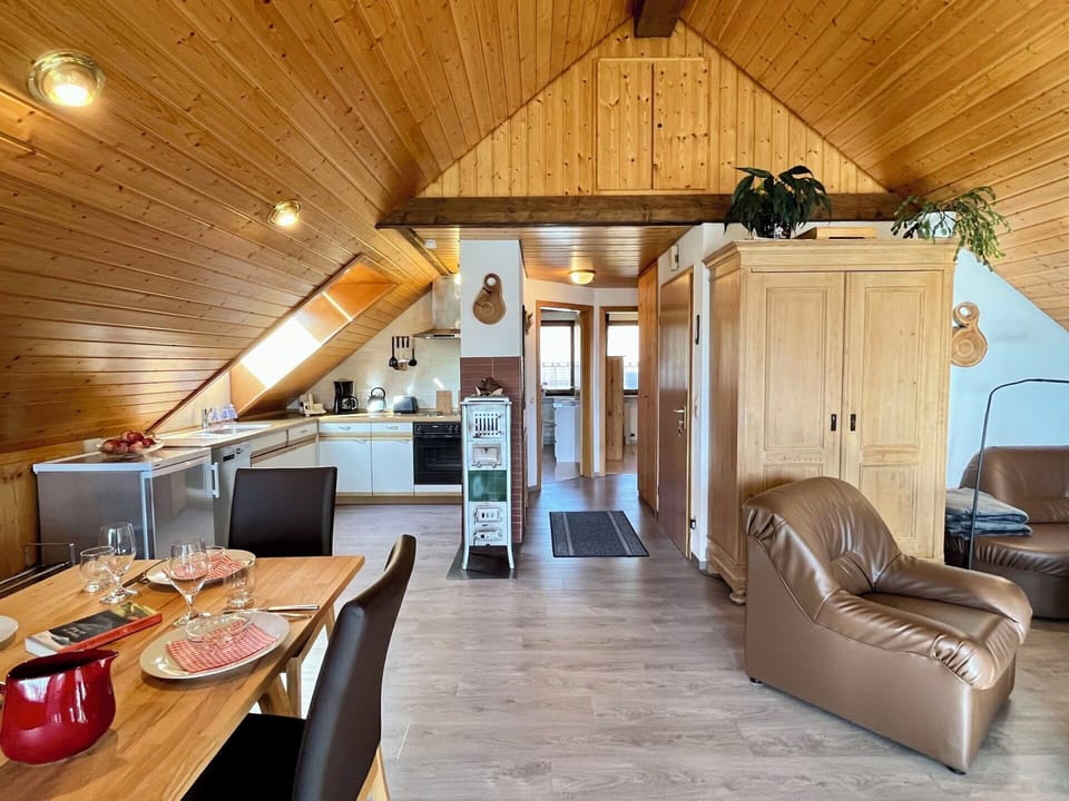 Furniture, Interior Design, Wood, Flooring, Ceiling, Floor, Kitchen, Room, Countertop, Chair