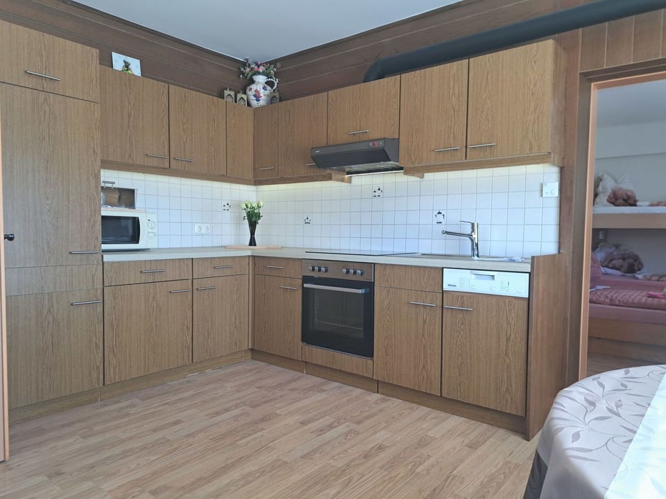 Cabinetry, Flooring, Countertop, Wood, Furniture, Kitchen, Floor, Interior Design, Drawer, Cupboard