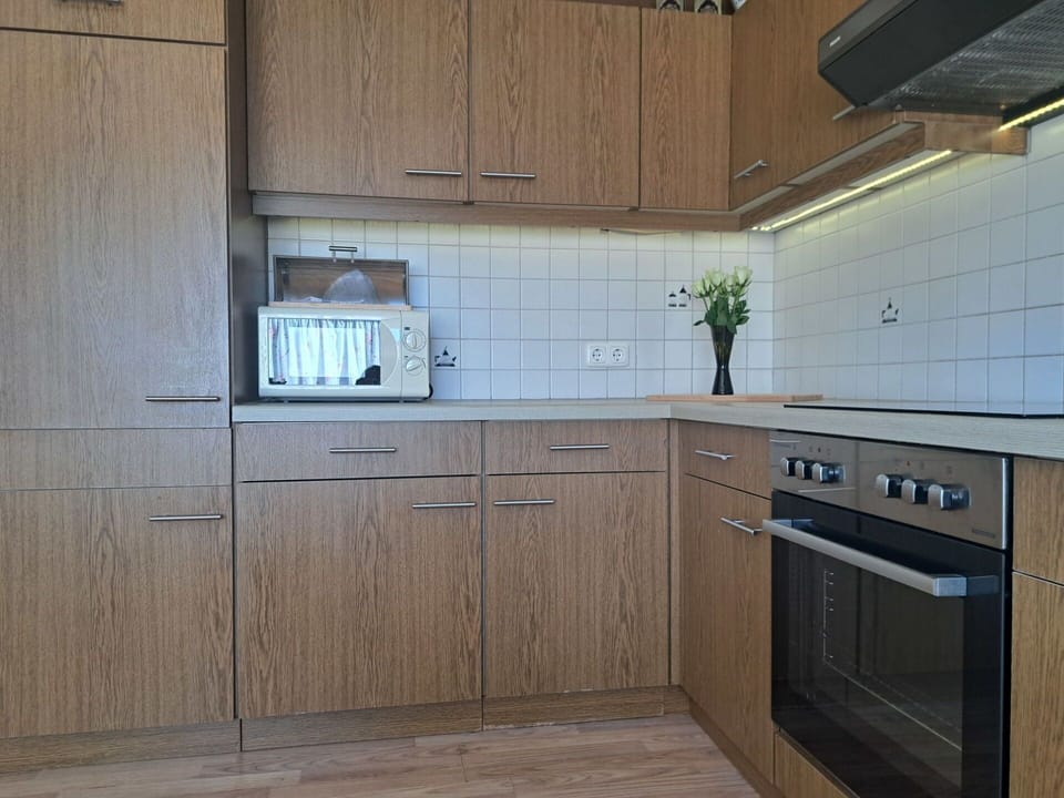 Kitchen, Cabinetry, Countertop, Flooring, Kitchen Appliance, Wood, Major Appliance, Floor, Drawer, Interior Design