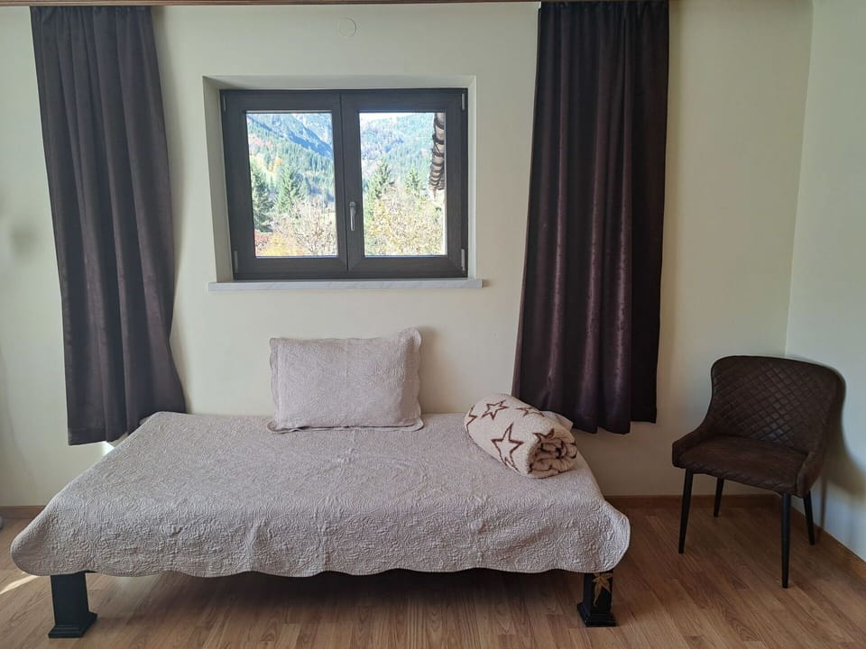 Furniture, Floor, Interior Design, Flooring, Wood, Window Covering, Bedroom, Textile, Bed, Room