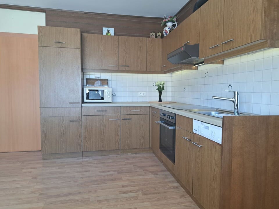 Flooring, Cabinetry, Countertop, Kitchen, Wood, Floor, Furniture, Interior Design, Kitchen Appliance, Kitchen Sink