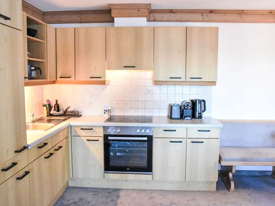 Wood, Kitchen, Furniture, Cabinetry, Countertop, Interior Design, Flooring, Drawer, Sink, Kitchen Appliance