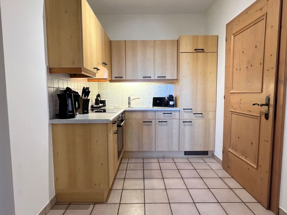 Furniture, Kitchen, Countertop, Cabinetry, Wood, Flooring, Interior Design, Kitchen Appliance, Floor, Cupboard