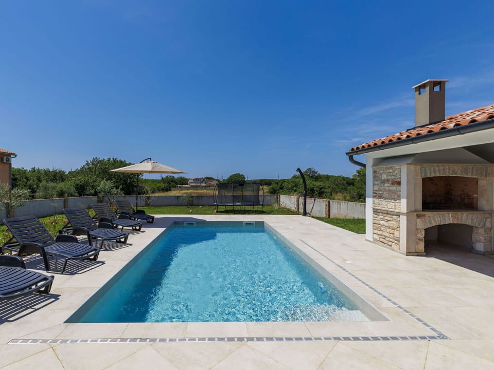 Swimming Pool, Blue, Architecture, Composite Material, Resort, Tile, Estate, Water Feature, Flagstone, Outdoor Furniture
