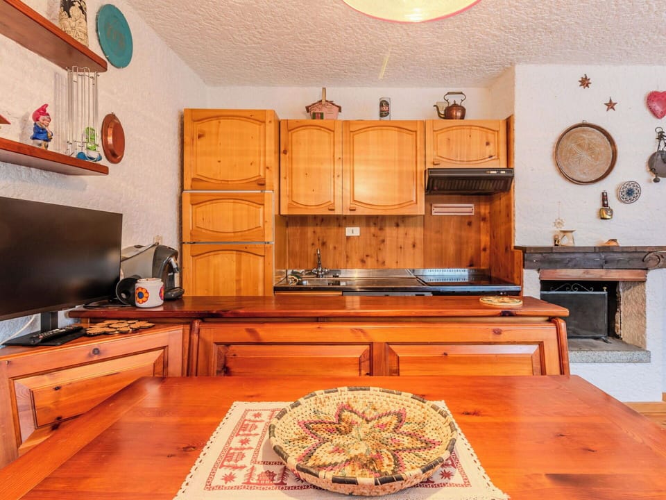 Furniture, Interior Design, Wood, Cabinetry, Flooring, Room, Kitchen, Floor, Ceiling, Lighting