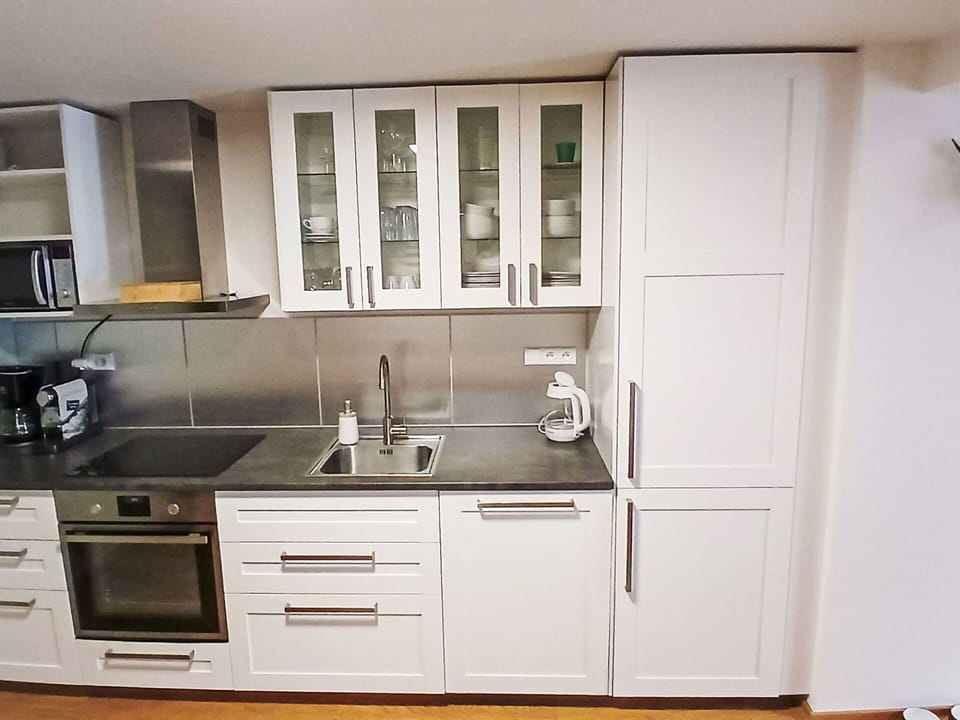 Cabinetry, Countertop, Kitchen, Flooring, Wood, Kitchen Appliance, Furniture, Interior Design, Cupboard, Home