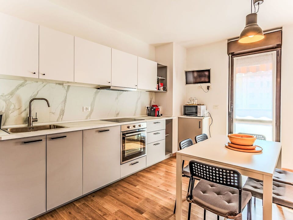 Kitchen, Kitchen Appliance, Flooring, Furniture, Interior Design, Countertop, Major Appliance, Floor, Wood, Cabinetry