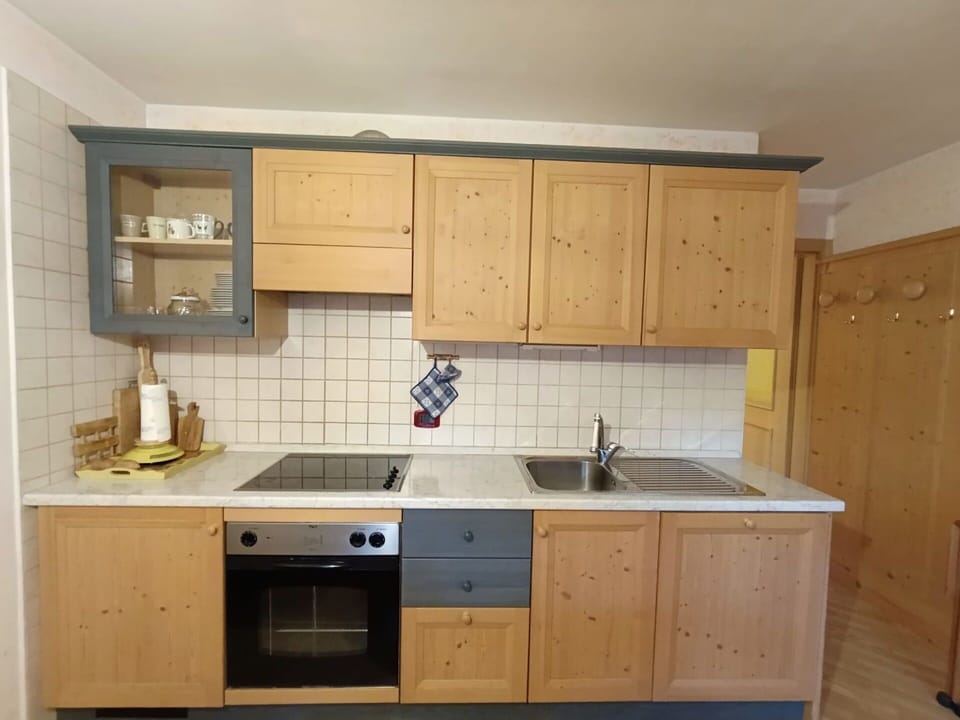 Furniture, Cabinetry, Kitchen, Countertop, Wood, Flooring, Kitchen Appliance, Interior Design, Cupboard, Floor