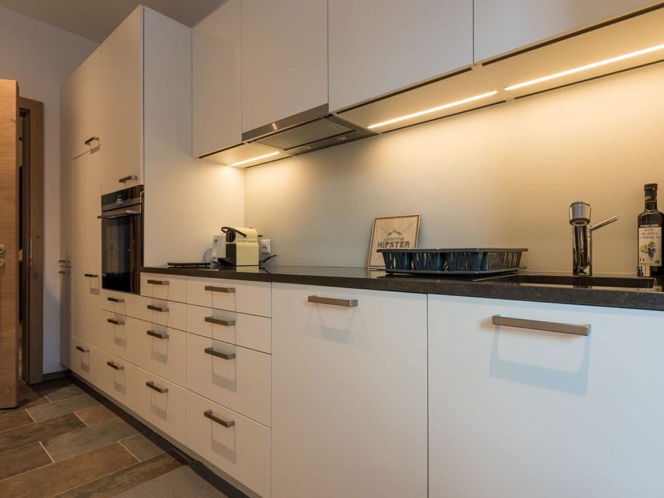 Countertop, Interior Design, Kitchen, Cabinetry, Flooring, Wood, Kitchen Appliance, Ceiling, Lighting, Light Fixture