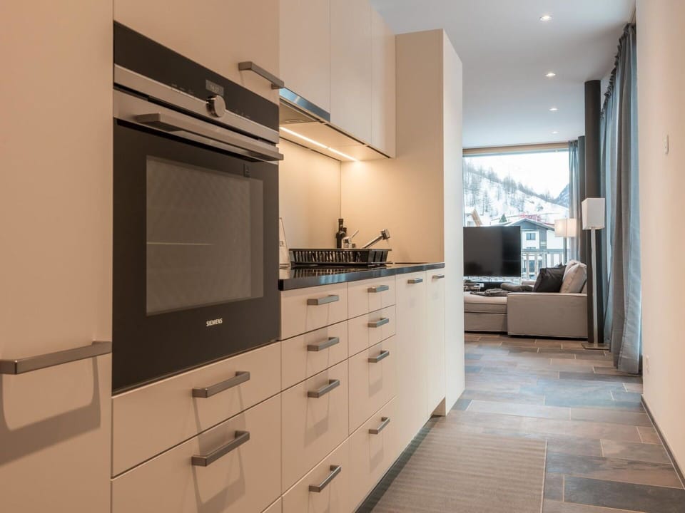 Kitchen, Countertop, Interior Design, Cabinetry, Kitchen Appliance, Flooring, Wood, Major Appliance, Furniture, Ceiling