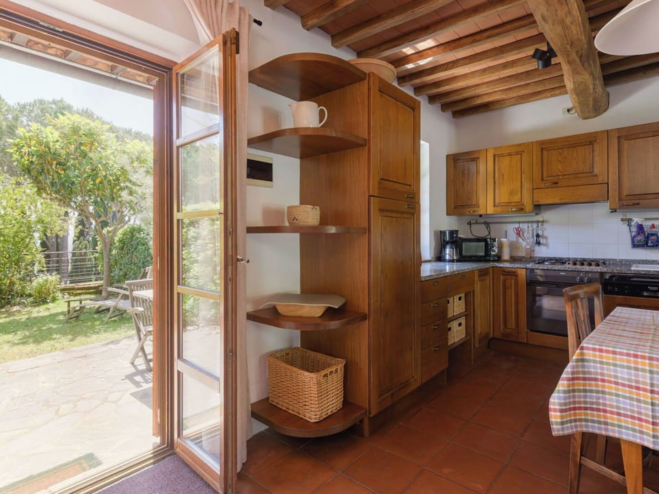Furniture, Wood, Flooring, Interior Design, Cabinetry, Kitchen, Floor, Countertop, Home, Cupboard