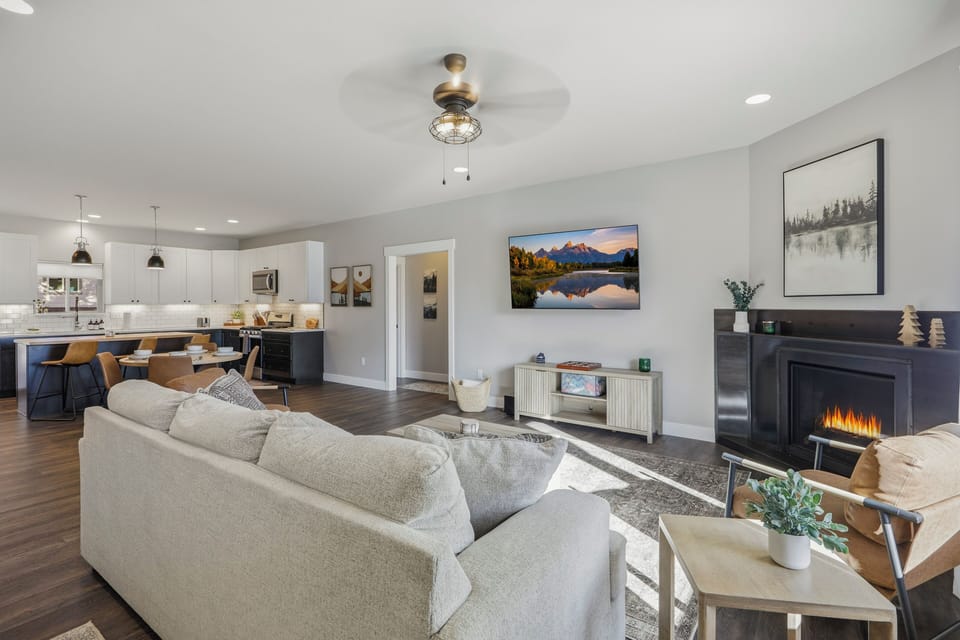 Beautiful, yet comfortable living room with  a cozy fireplace
