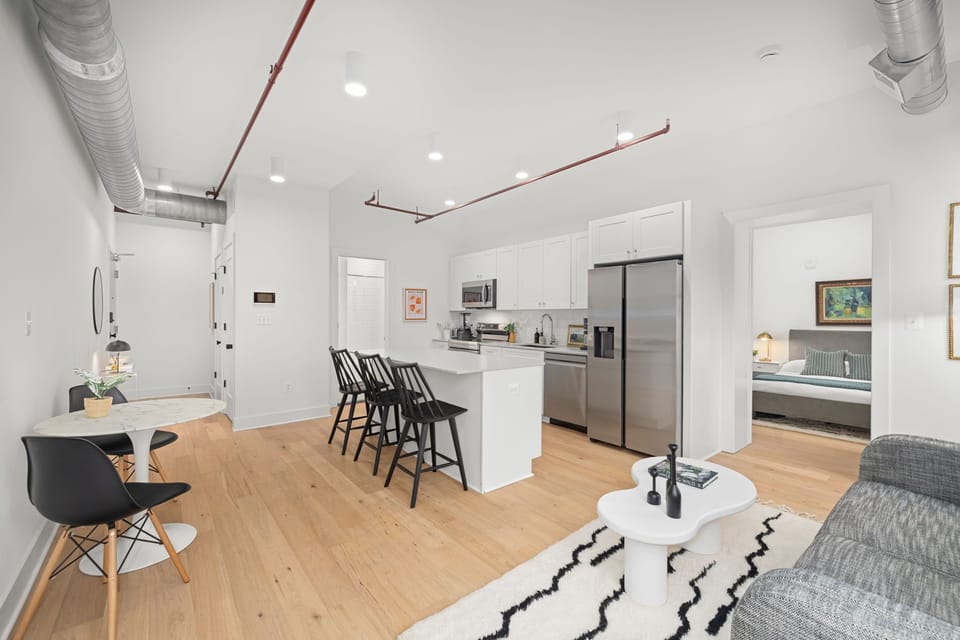 Full layout: living, kitchen, dining, and bedroom access