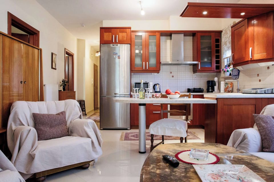 Relaxed living and dining space with soft lighting and a welcoming atmosphere.