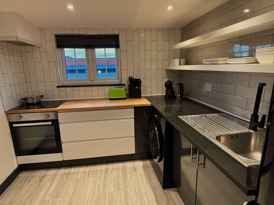 Full Kitchen with cooking utensils and cookware to create the perfect snack or meal
