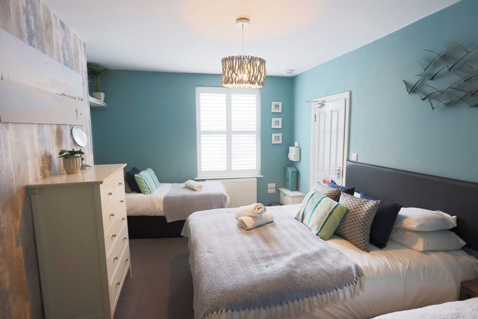 GF bedroom. Sleeps 4. Double and 2 singles. En-suite.