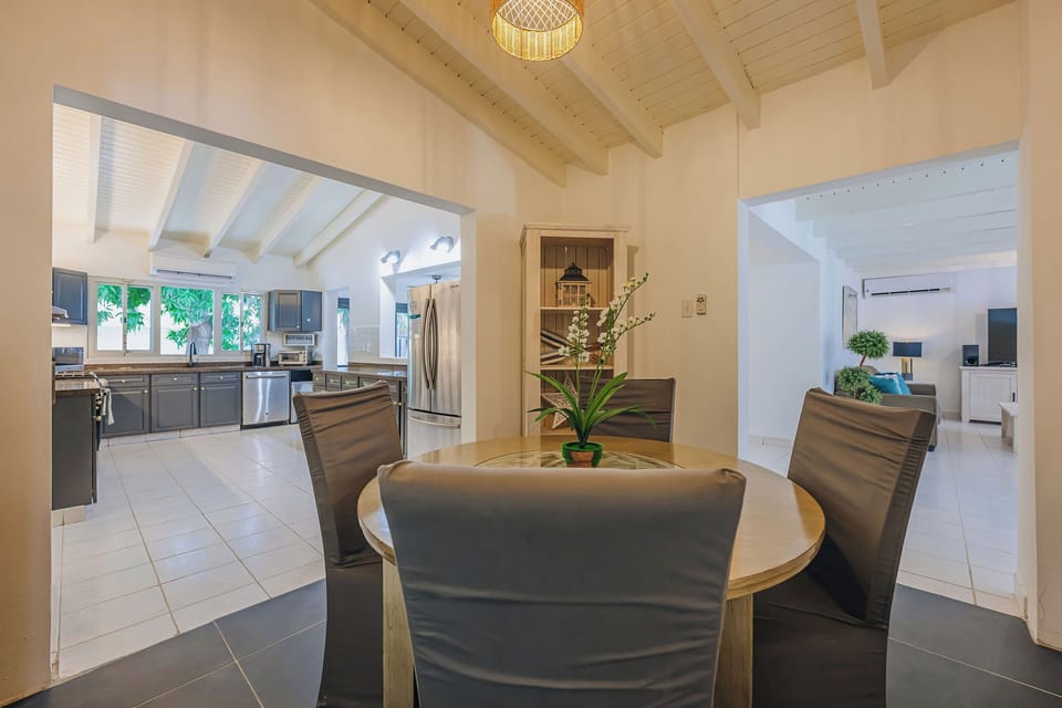 Dining space with direct flow to the kitchen and living area