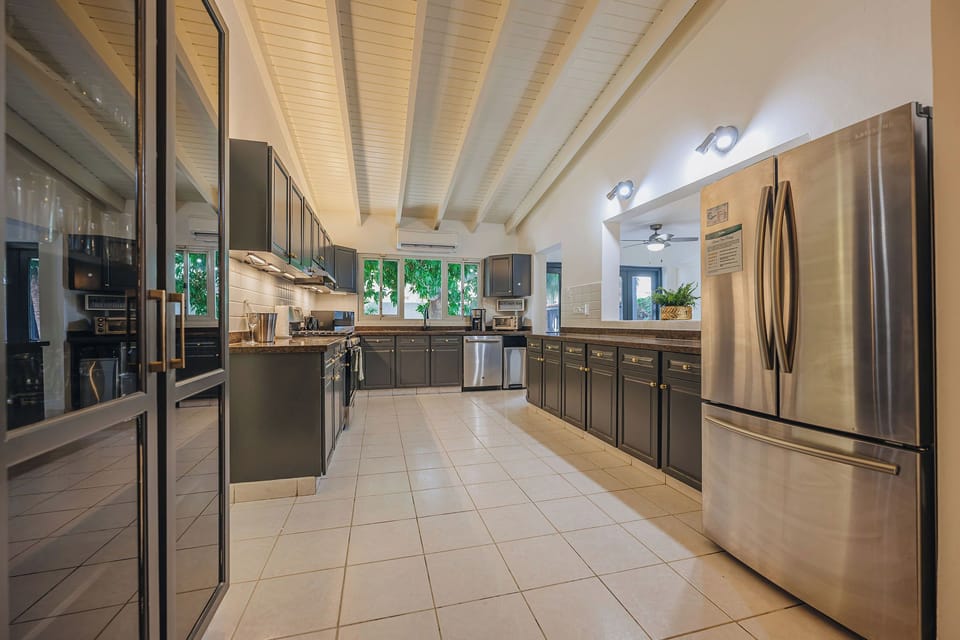 Fully equipped kitchen with ample counter space and storage