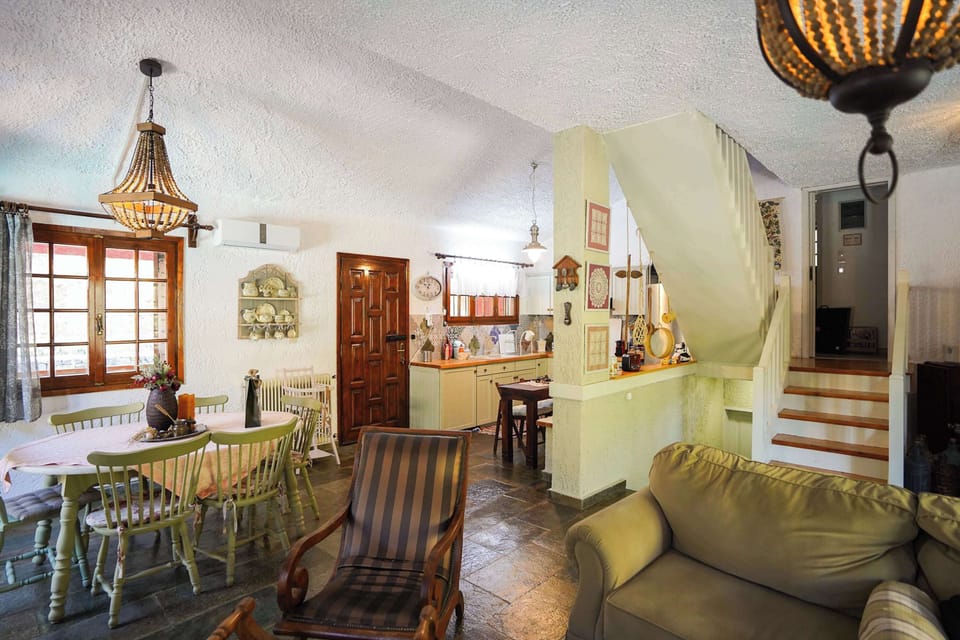 Traditional dining area with classic wooden furniture and warm detailing.
