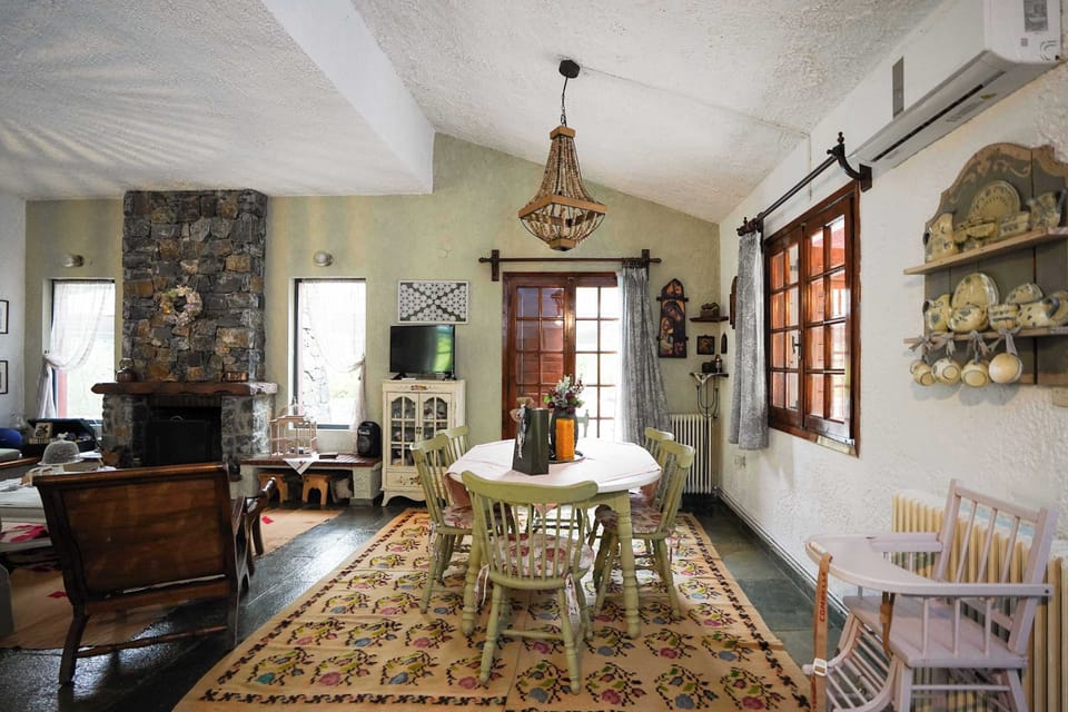 Dining space with mountain views and classic rustic design.