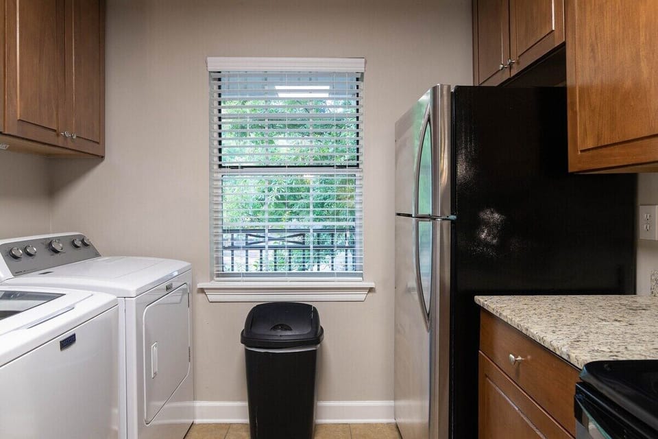 Includes laundry area.