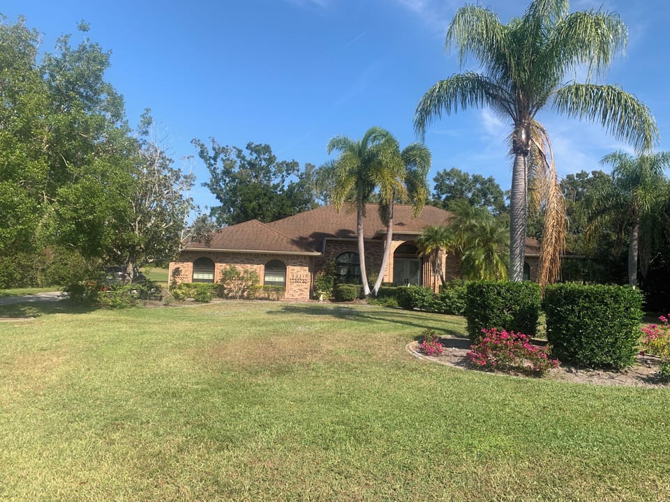 Set back and a nice front lawn.