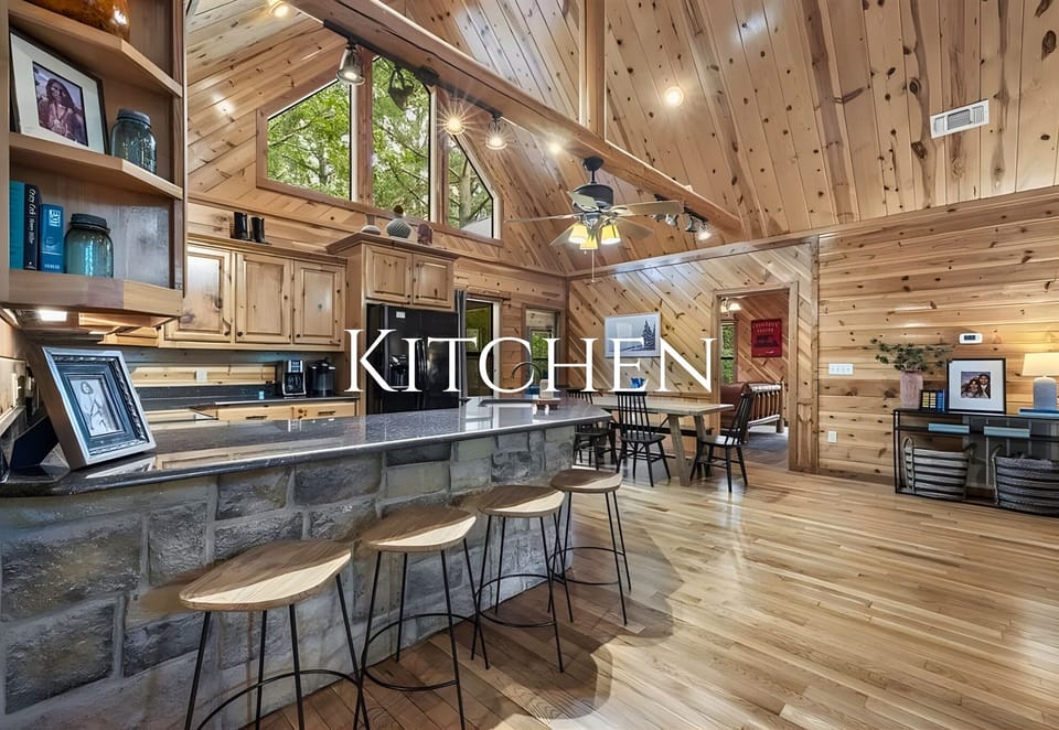 Meal prep feels easy in this roomy kitchen, complete with generous counter space and bar seating for chatting while you cook.