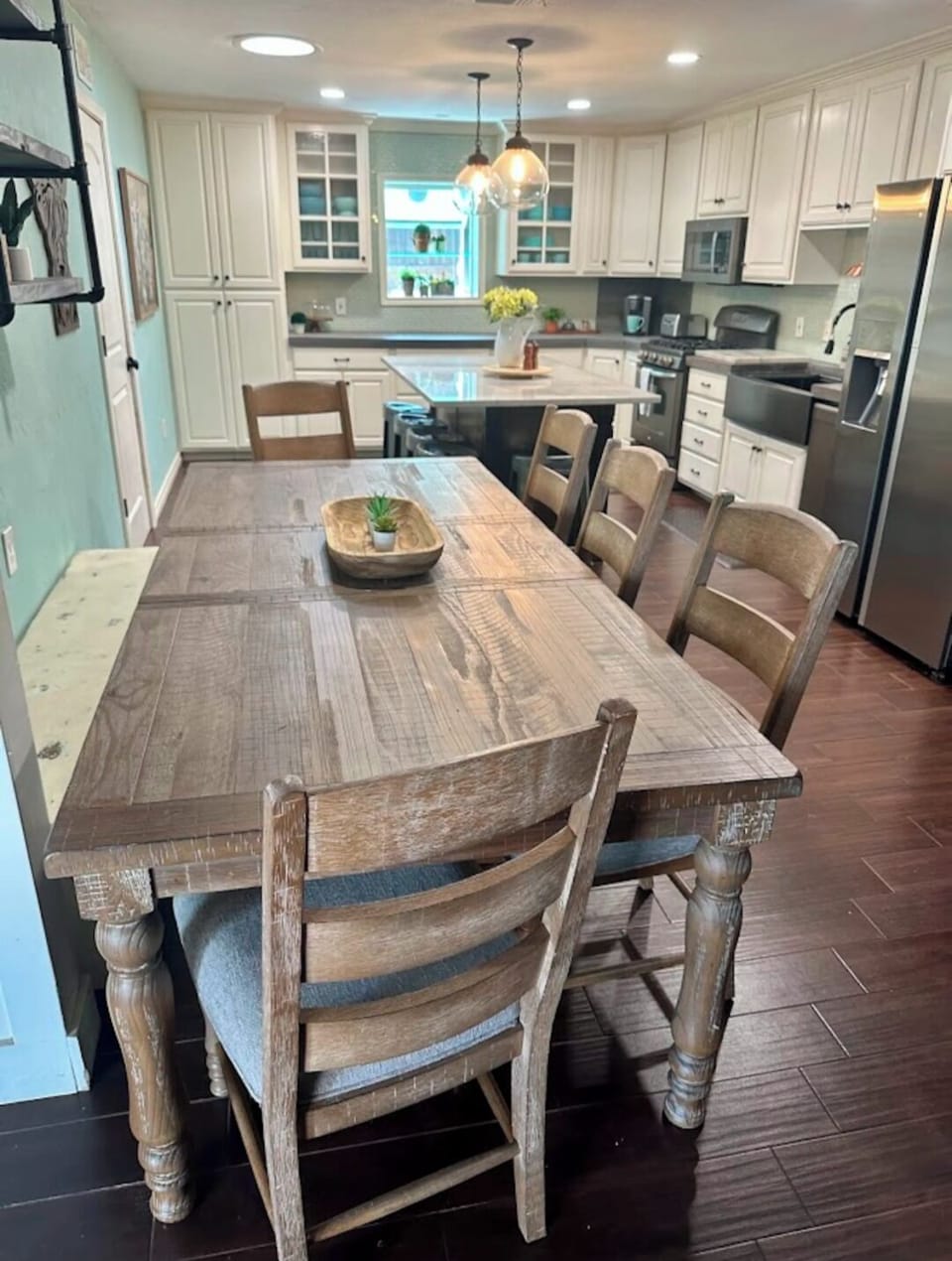 Dining table plus island bar sitting fits a dozen!