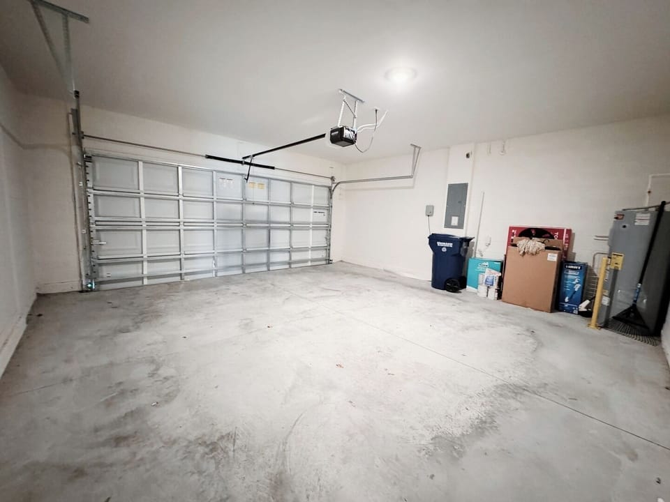 Private attached garage, offering secure parking for your vehicle and direct, easy access into the home.