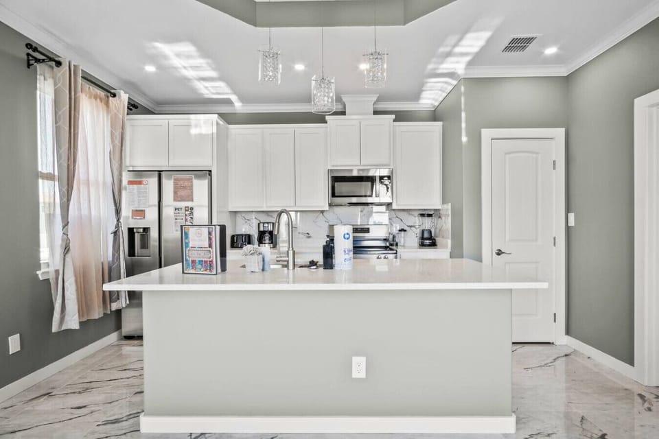 “A light-filled kitchen made for morning coffees and late-night snacks.”