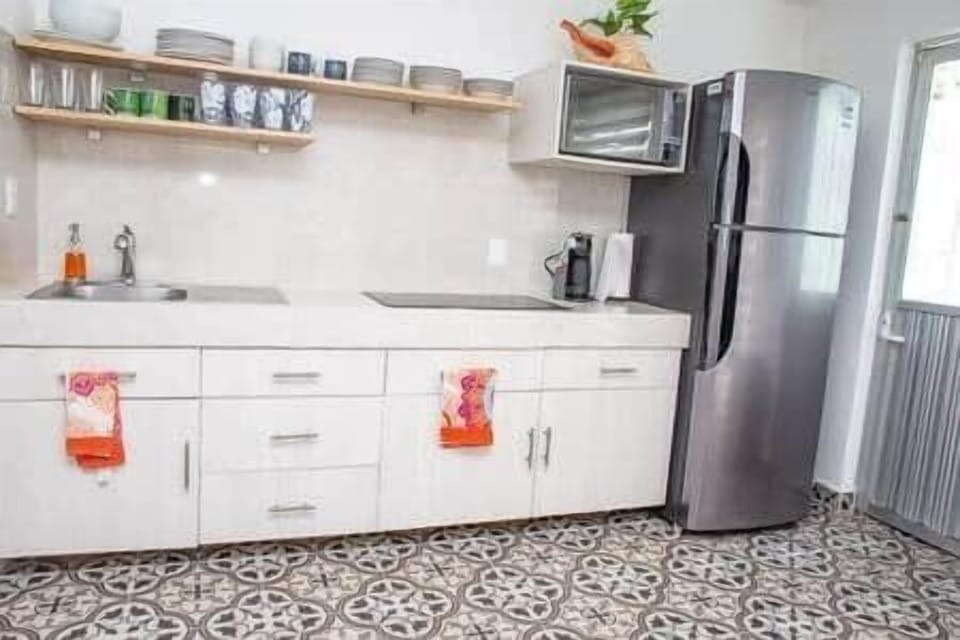 The kitchen is fully stocked for all your cooking needs. 