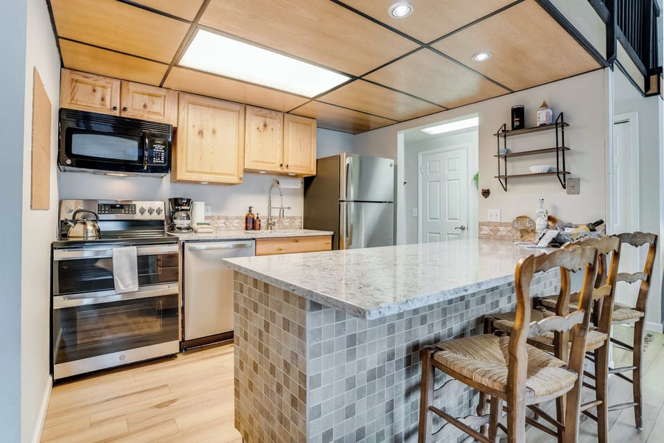 The kitchen at Heis Haus features brand new appliances with air fryer added 2025, updated counters, fresh paint, every type of coffee you can imagine, and more!  Arrive to our curated guest swag bags and escape to Heis!