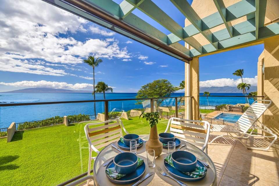 Sip coffee or enjoy a sunset dinner from your private patio overlooking the waves and the shimmering pool area