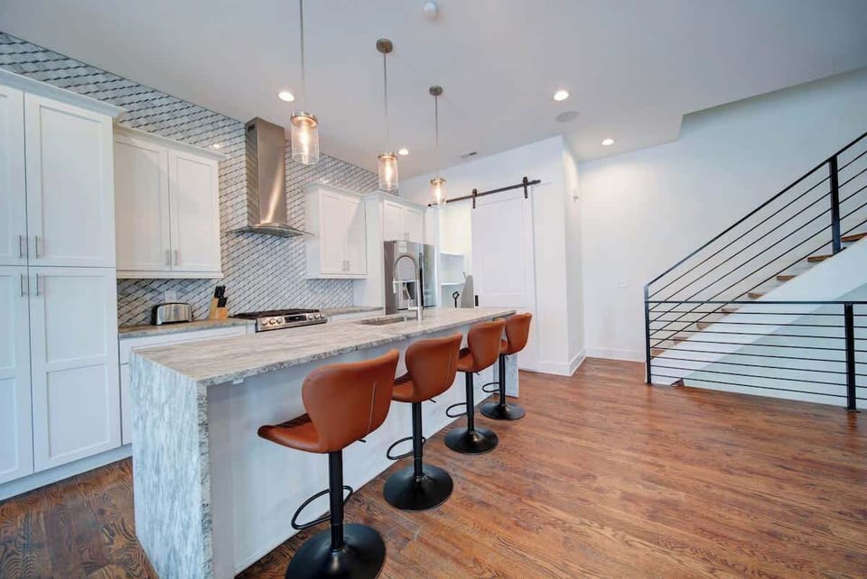 Fully equipped kitchen with essentials, cookware, and space to prepare meals comfortably.
