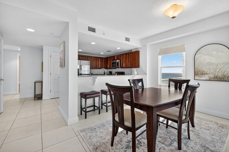 Dining table and counter seating to enjoy meals with everyone