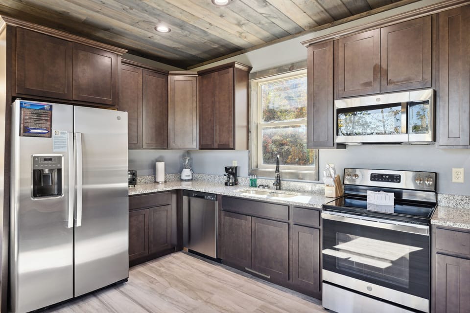 new stainless appliances and 9 foot cielings