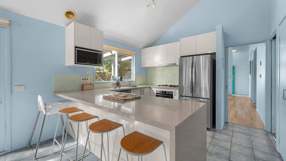 Aldebaran Road Beach House | Kitchen | Highchair | Microwave | Gas cooktop