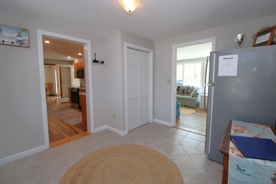 Entryway kitchen on Left, Sun Room On Right