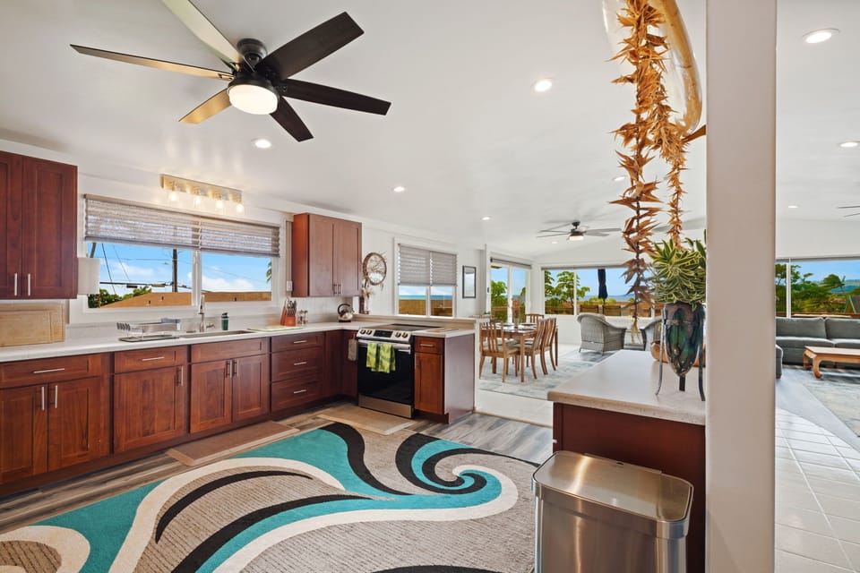Appliances, a full kitchen island, and enough counter space to actually cook. Hale O'Kapeka is stocked and ready — all you have to do is find the farmers market.