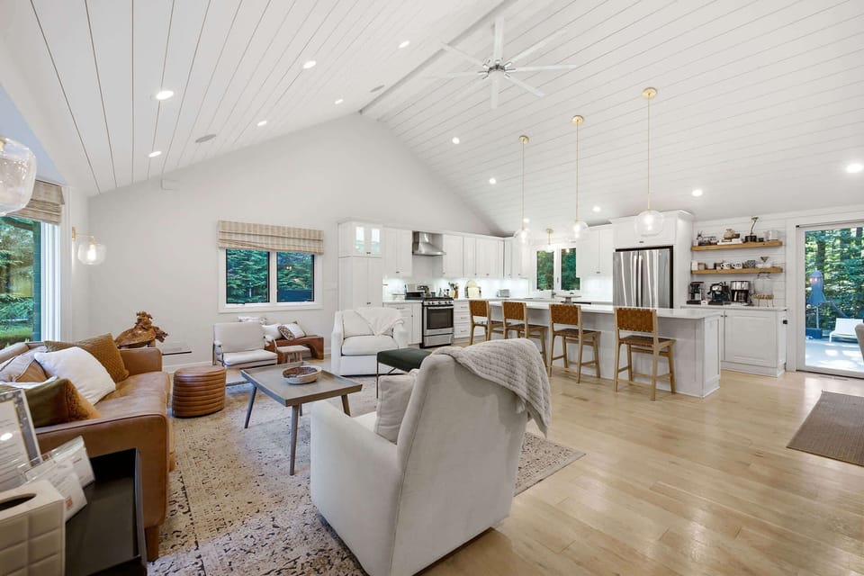 A bright gathering space where cooking, lounging, and living come together.